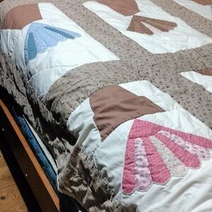 Elegant Yellow and Brown Patchwork Quilt